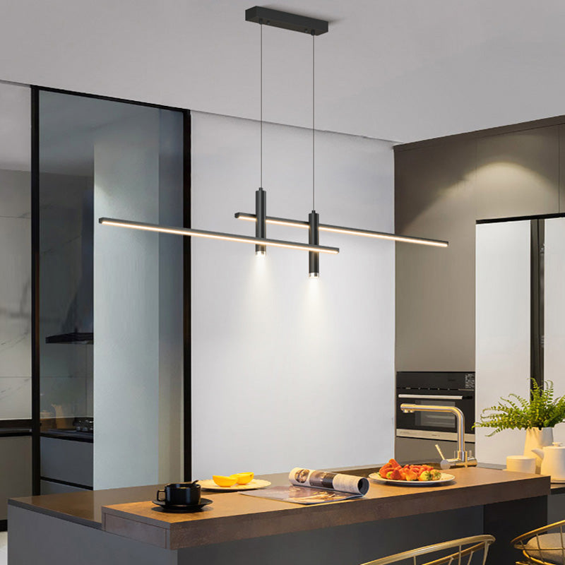 Black modern linear suspension pendant light elegantly hanging over a kitchen island